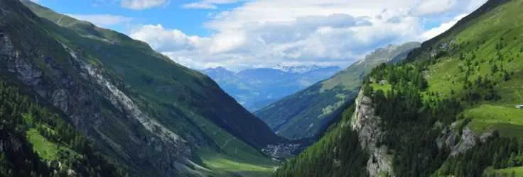 Deep green alpine valley in Switzerland