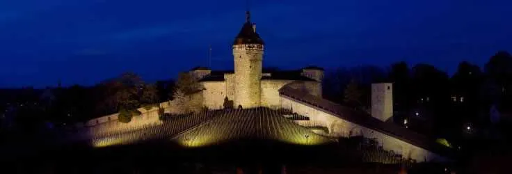 Illuminated Swiss castle at night