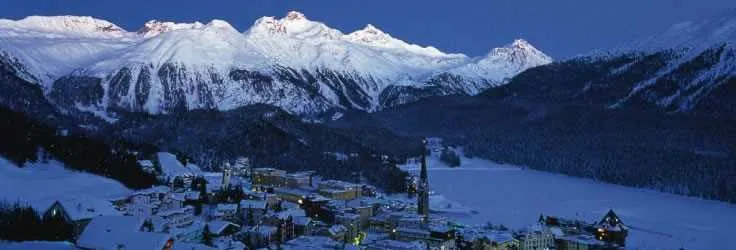Snow-covered alpine village and mountains in Switzerland
