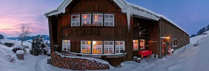 Traditional mountain house in snowy Switzerland