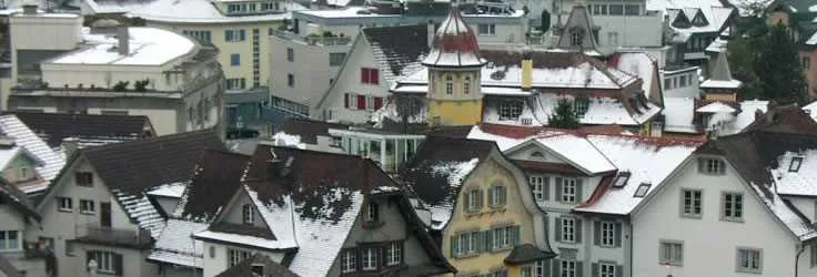 Snow-covered rooftops in a Swiss town