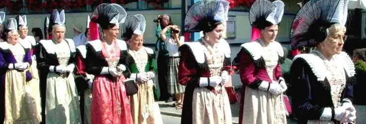 Swiss folk dancers in regional costumes