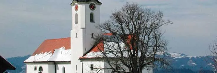 White church in the Swiss countryside